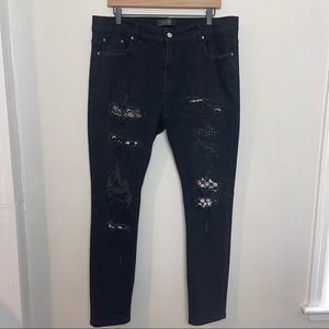 AMIRI- Black Distressed Multi Bandana Patch Skinny Jeans